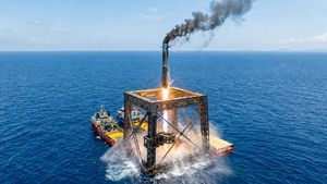 China's Long March 10B rocket booster being captured by a net on a sea platform, symbolizing a major space breakthrough in 2026.